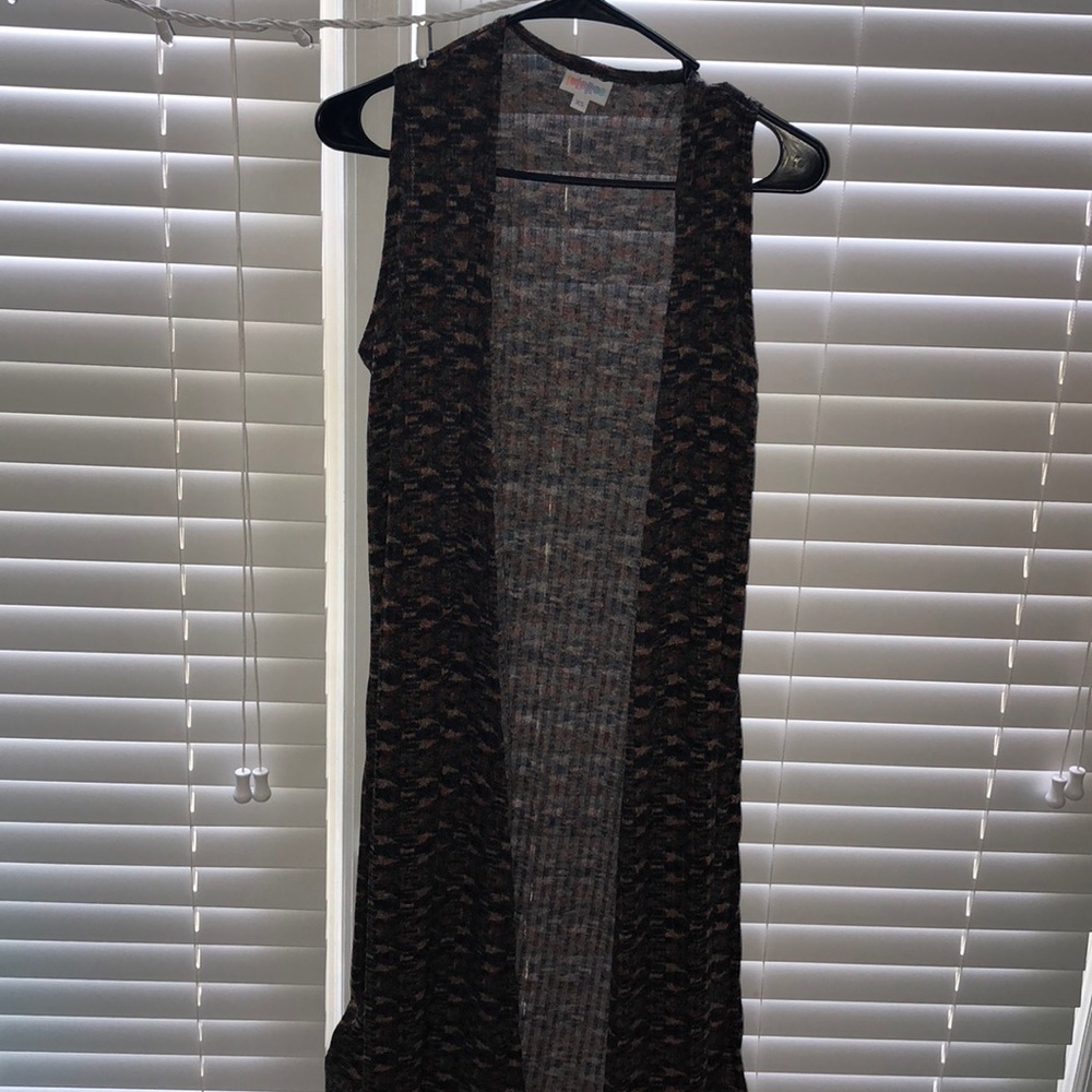 Long patterned sleeveless cardigan
